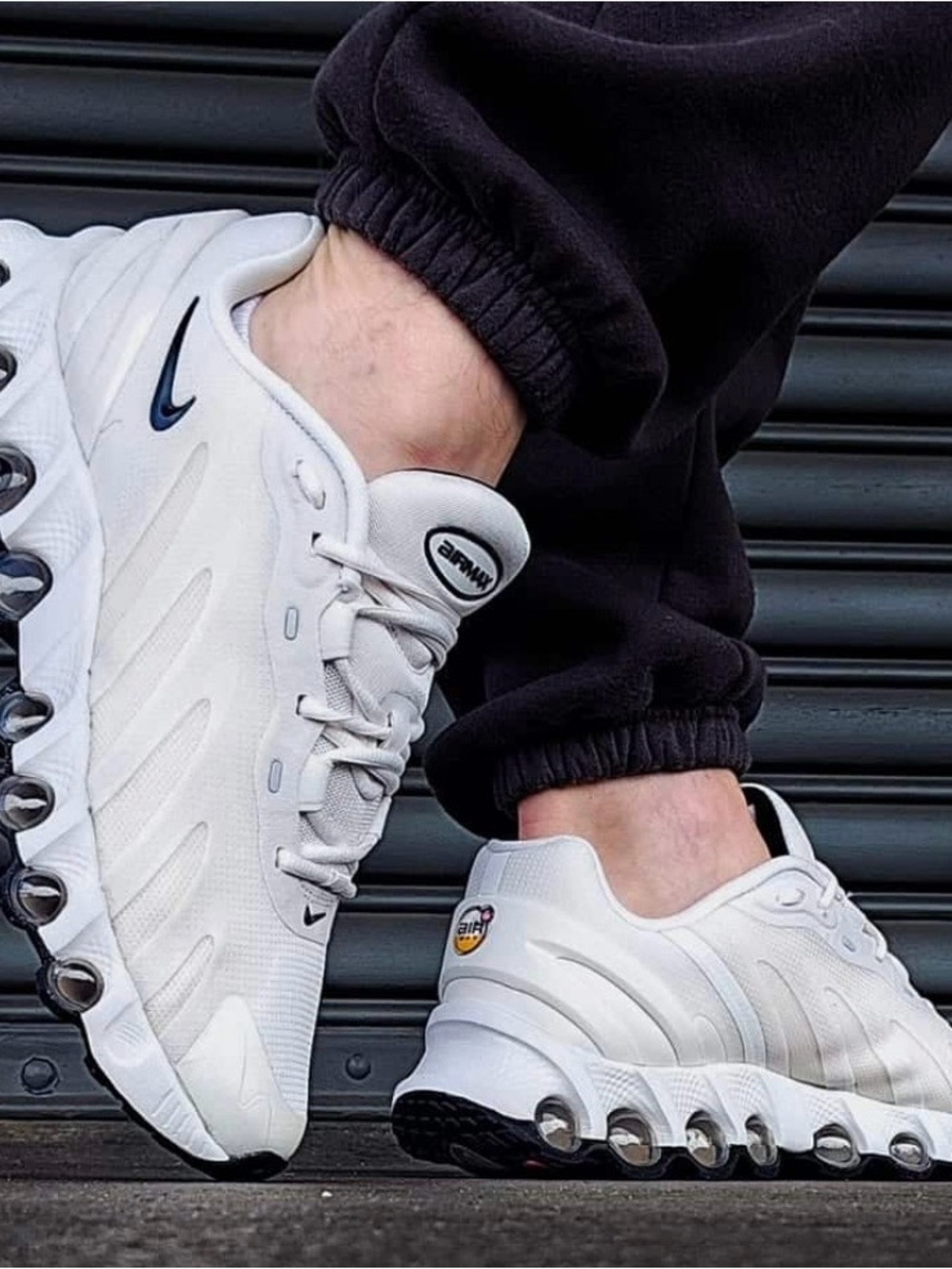 Nike Air Max DN8 in the Sail/Black-Fossil colorway, women's sz 8